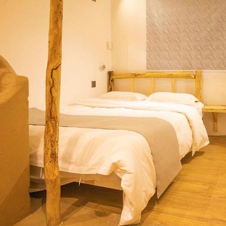 Right Here Hotel Dunhuang Buitenkant foto