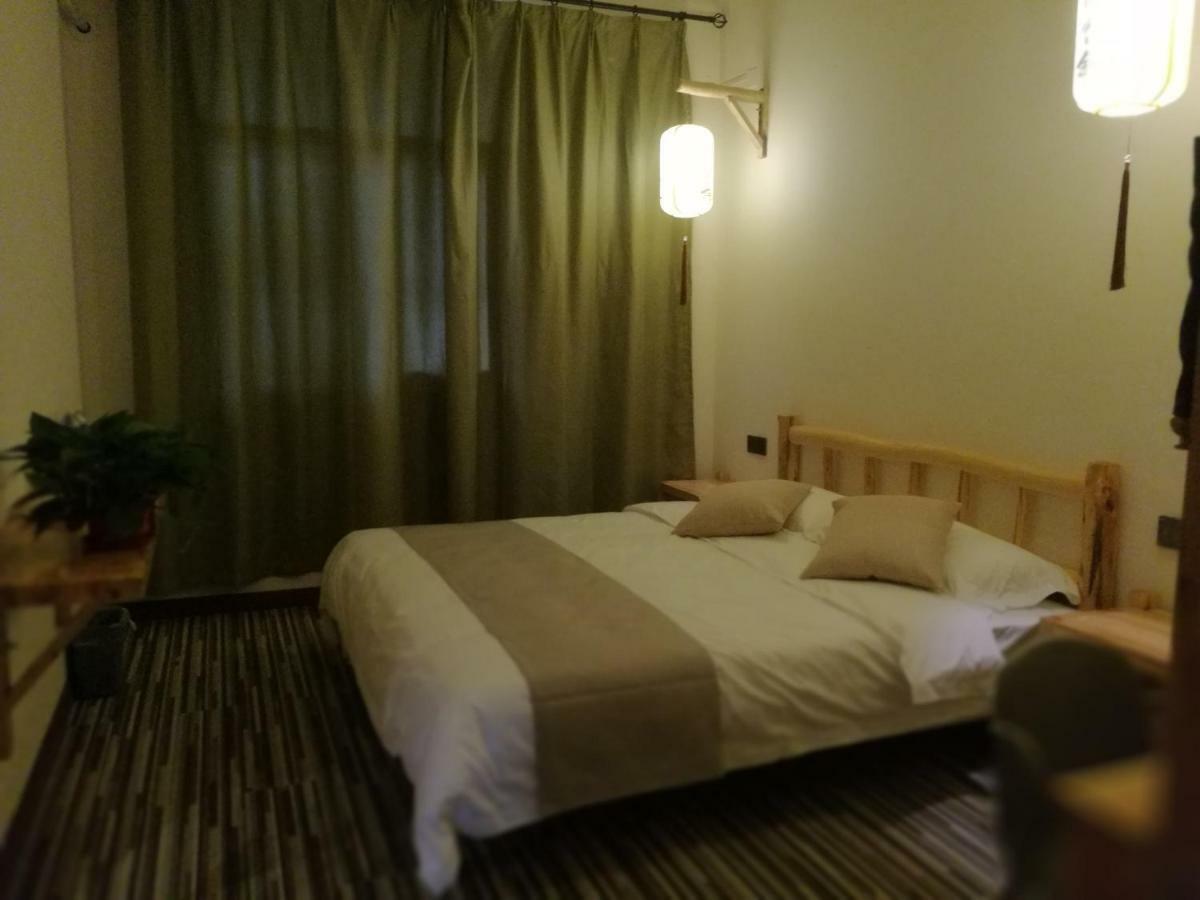 Right Here Hotel Dunhuang Buitenkant foto